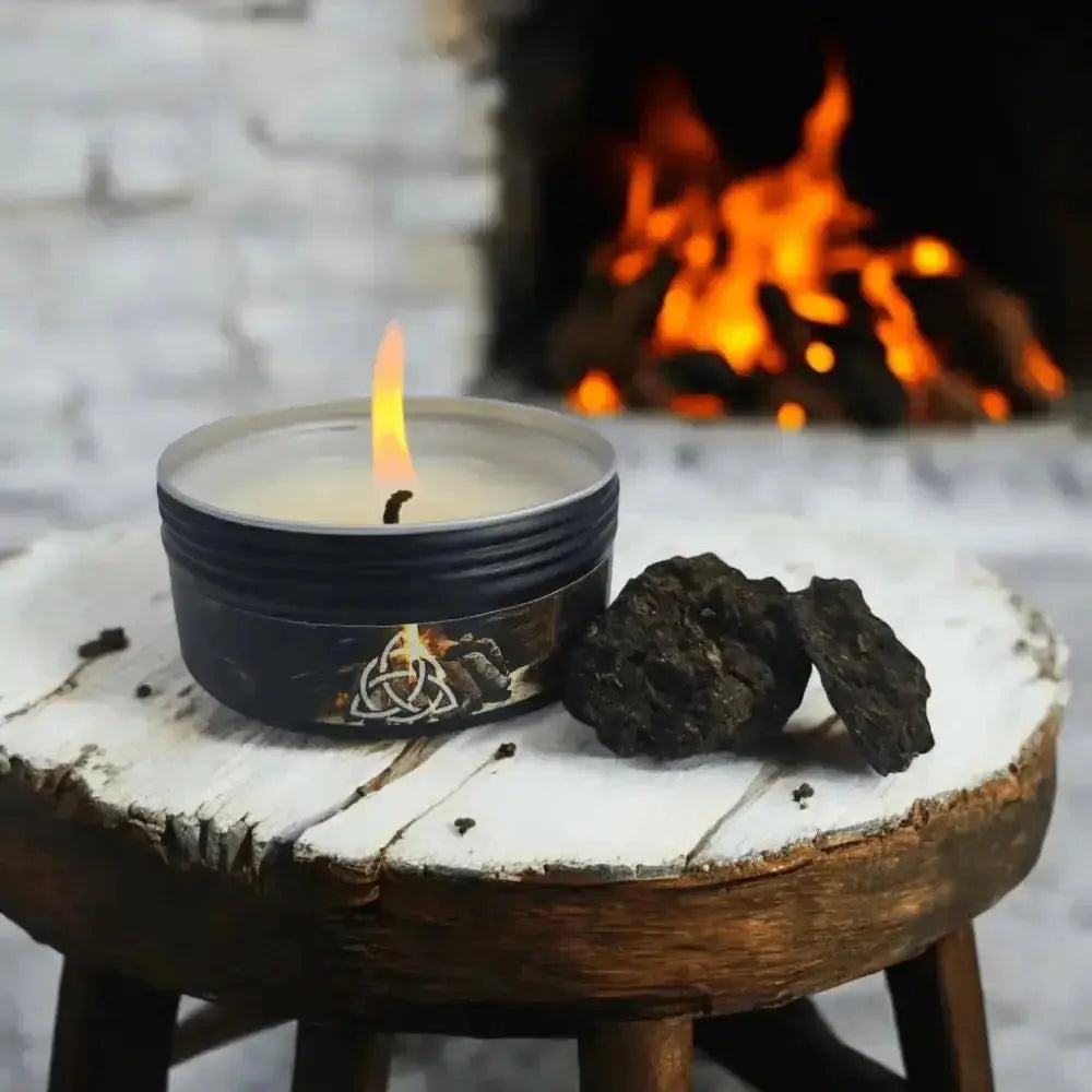 Irish Turf Candle by fireplace