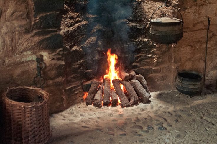 Authentic Irish Turf fire in dark cottage